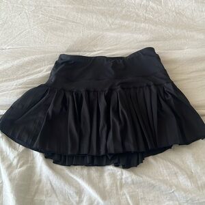 Black gold hinge skirt
